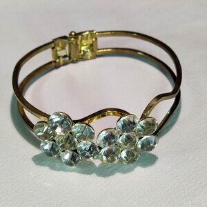 1960 Vintage Clamper Bracelet with Gold Tone Metal and Rhinestone Flower